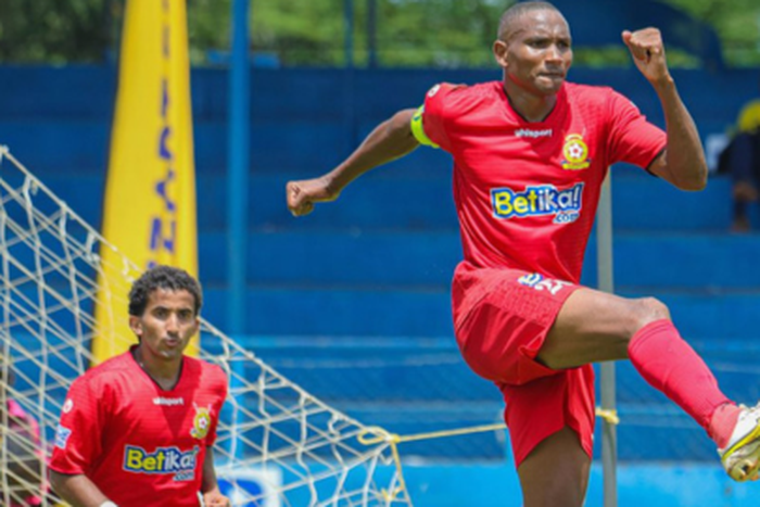 Kenya Police captain David Simiyu and midfielder Mohammed Bajaber celebrate win against Kapenguria United in the FKF at the Machakos stadium on April 13.