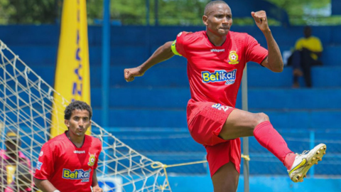Kenya Police captain David Simiyu and midfielder Mohammed Bajaber celebrate win against Kapenguria United in the FKF at the Machakos stadium on April 13.