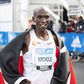 Eliud Kipchoge poses for a photo after winning the 2022 Berlin Marathon