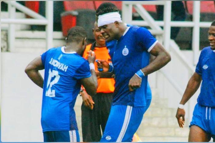 Rivers United’s Korvah celebrates with his teammates.