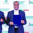AK president Jack Tuwei (L) with Chairman of the Standard Chartered Nairobi Marathon Local Organizing Committee Peter Gitau  (R)