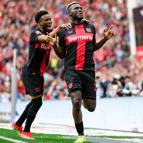 Victor Boniface celebrates is now famous trademark celebration with teammate Nathan Tella