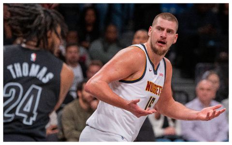 Denver Nuggets star Nikola Jokic receives a horse head gift in China