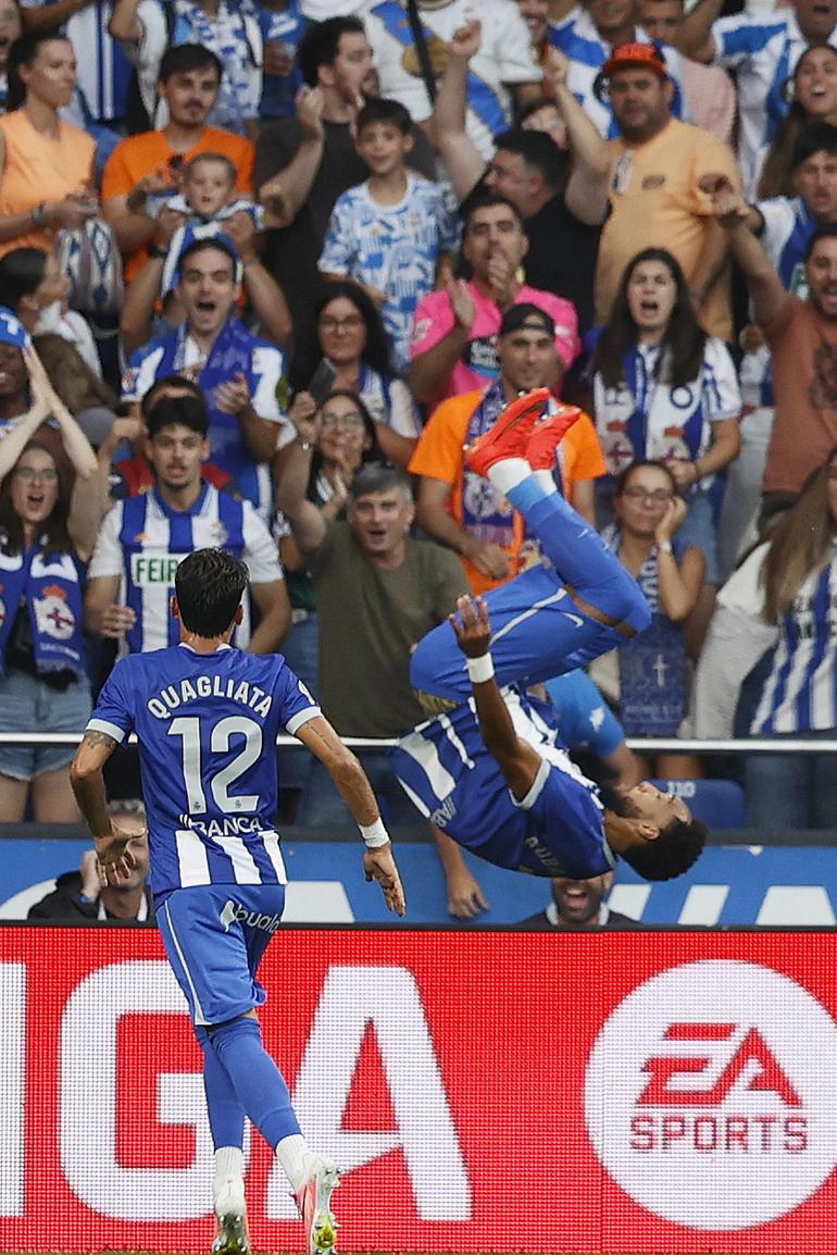 Aubameyang celebrates in trademark style.