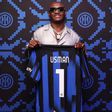 According to Usman's post on social media, he was in Italy to watch the Milan derby between Inter Milan and AC Milan. X/Kamaru Usman