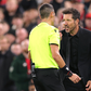 feree Maurizio Mariani and Atletico Madrid coach Diego Simeone argue - Photo: Simon Stacpoole Offside.