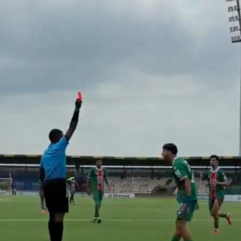 The Algeria defender shown the red.