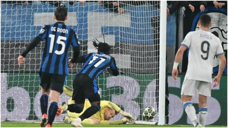 Club Brugge's Mignolet denies Ademola Lookman in the Champions League.