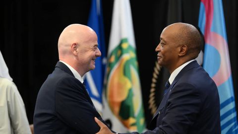 CAF President Patrice Motsepe congratulates FIFA President Gianni Infantino on his re-election