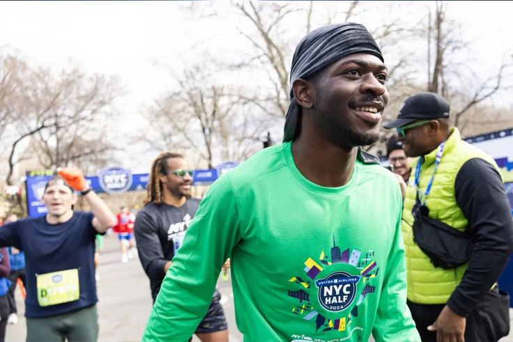 American rapper Lil Nas X wows fans with fashionable sneakers at Sunday's New York City Half Marathon