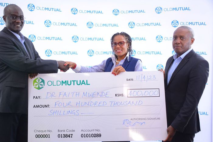 Dr. Faith Mwende at the center