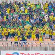 Yanga SC fans celebrate after CAF Cofederation Cup match win.