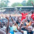 Shabana FC fans carry players aloft after securing top flight promotion.