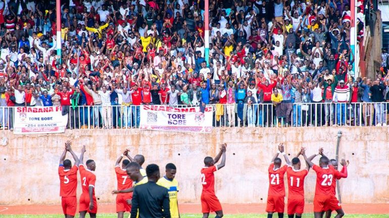 Shabana FC players applaud fans.