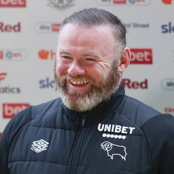 Wayne Rooney's former look.