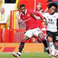 Willian contesting for the ball with Marcus Rashford.