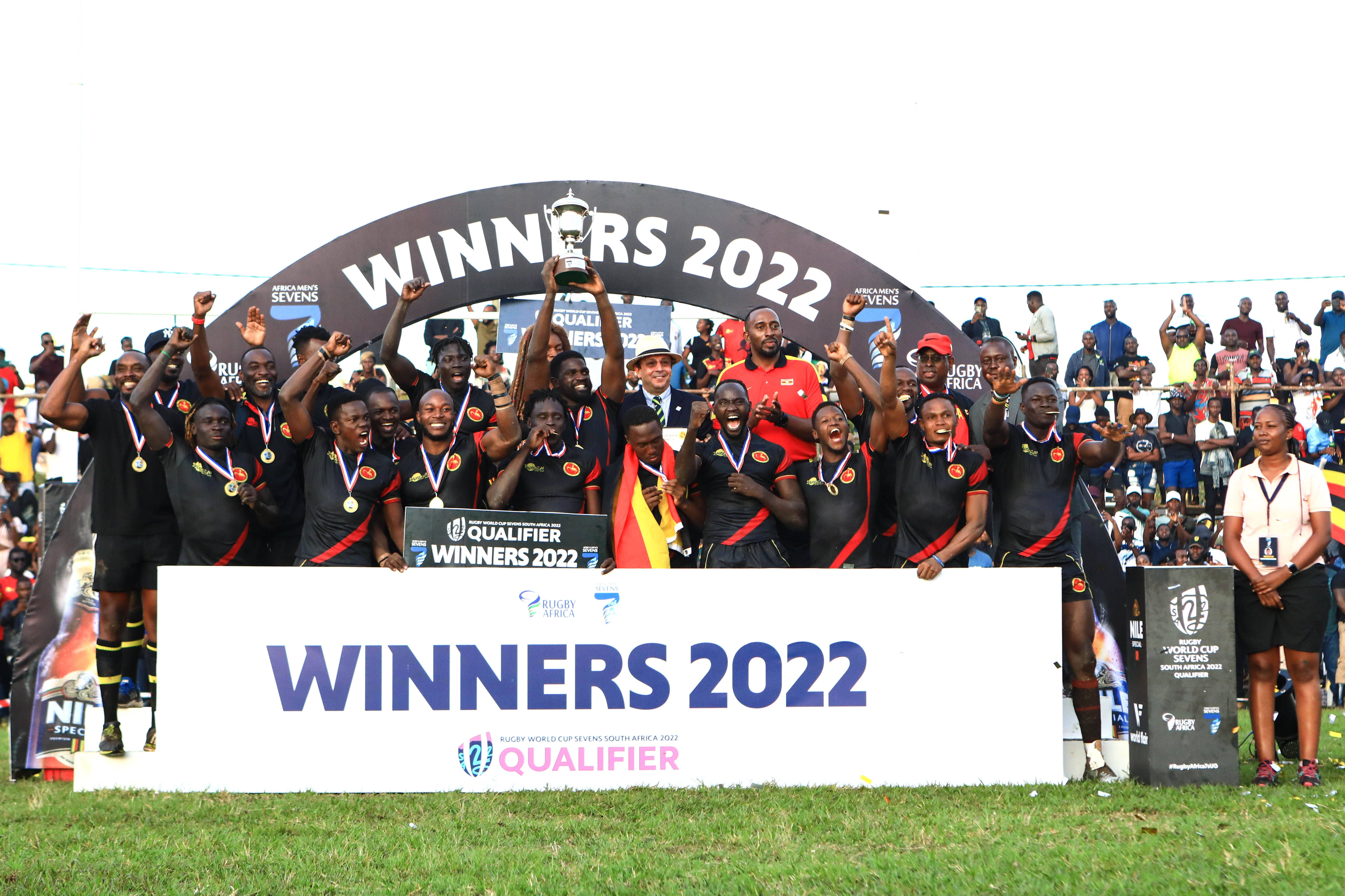 ganda celebrates during the awarding ceremony after beating Zimbabwe 28-0 in the final of the 2022 Rugby Africa Sevens at the Kyadondo Rugby Club