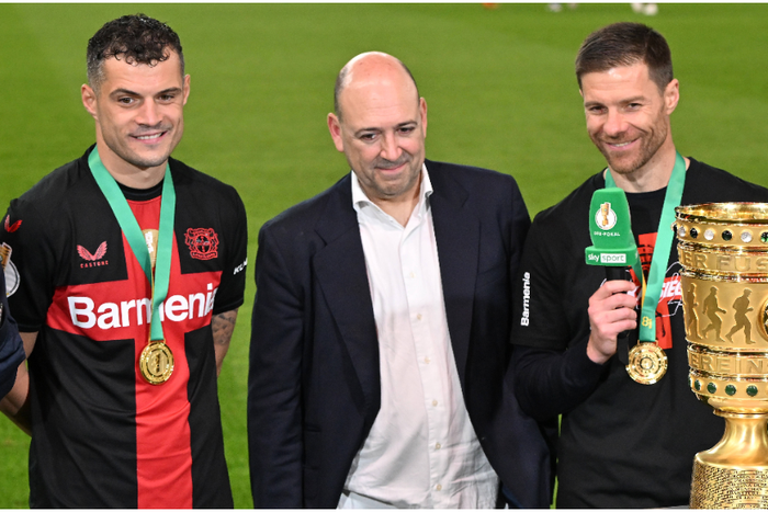 Granit Xhaka and Xabi Alonso after winning the DFB Pokal title |Pulsesports.ng