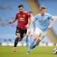 Manchester United s Bruno Fernandes (left) and Manchester City s Kevin De Bruyne battle for the ball during the Premier League match at the Etihad Stadium || Image credit: Imago