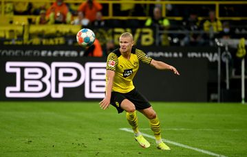 Haaland double sees Dortmund hold off Union to climb to second