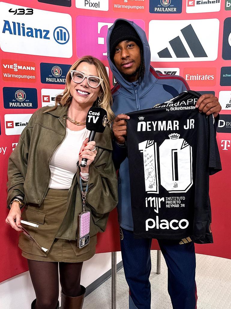 Olise gets his signed shirt from Neymar.