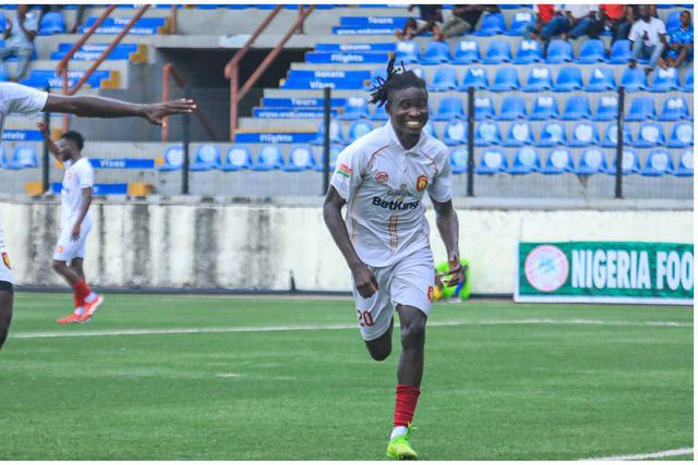 Ikorodu City players celebrating a goal against Nasarawa United in front of a packed home crowd, signifying their 23-match home unbeaten streak.