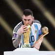 Lionel Messi with the World Cup trophy after leading Argentina to victory against France in the final in Qatar