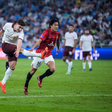Julian Alvarez of Manchester City and Ken Iwao of Urawa Reds during the FIFA Club World Cup semifinal match between Urawa Reds and Manchester City on December 19, 2023 in Jeddah || Image credit: Imago