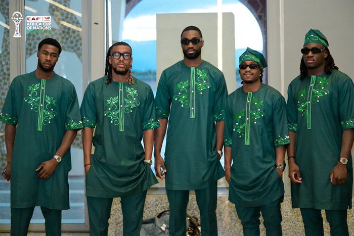 Super Eagles wearing custom-made green native attire. || X