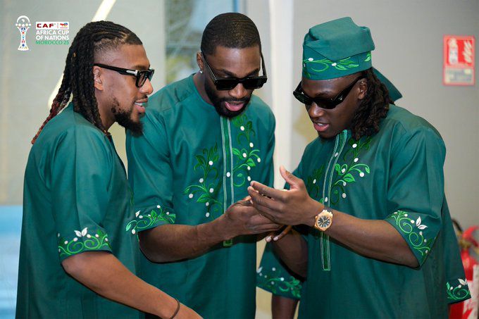 Super Eagles wearing custom-made green native attire. || X