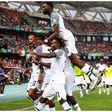 Super Eagles players celebrate against Cote d'Ivoire at AFCON