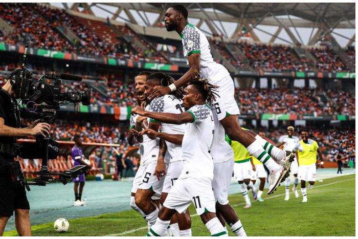 Super Eagles players celebrate against Cote d'Ivoire at AFCON