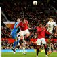 Harry Maguire of Manchester United heads the ball during their FA Cup match against Fulham at Old Trafford.