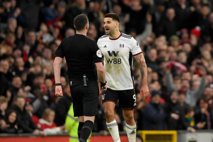 Aleksandar Mitrovic gets physical with referee Chris Kavanagh