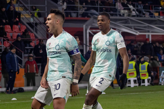 Lautaro Martinez and Denzel Dumfries celebrate a goal for Inter
