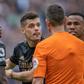 Granit Xhaka and Thomas Partey of Arsenal argue with referee.
