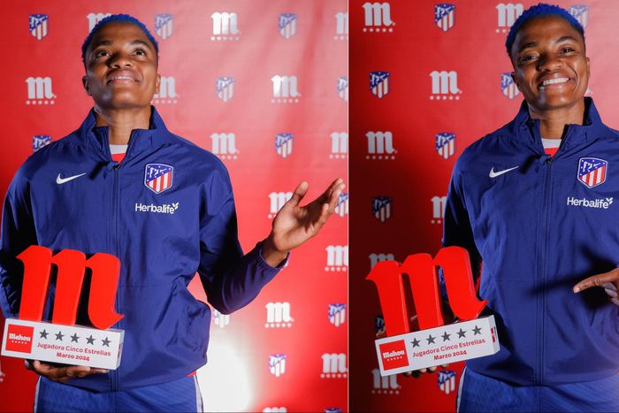 Super Falcons captain Rasheedat Ajibade shows off Player of the Month award.