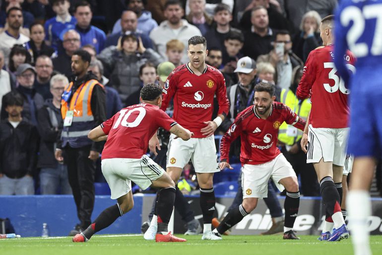 Matheus Cunha doing his 'surfing' celebration after scoring against Chelsea at Stamford Bridge | Imago