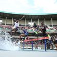 Amos Kirui jumps a water barrier at the Kip Keino Classic