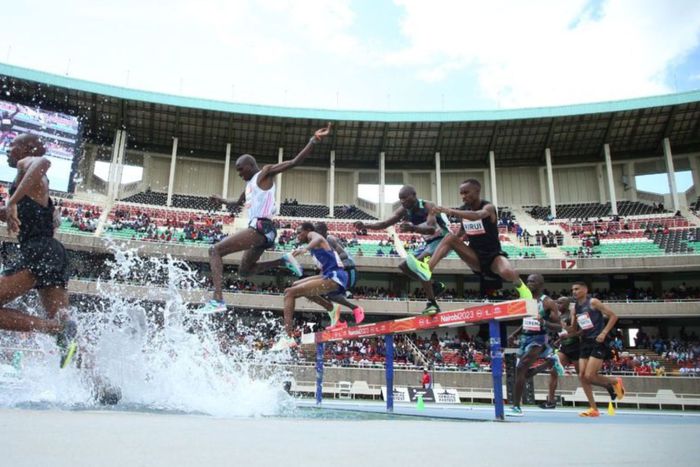 Amos Kirui jumps a water barrier at the Kip Keino Classic