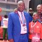 Eunice Mburu of Kenya (centre) after winning bronze at the Africa Wrestling Championships.