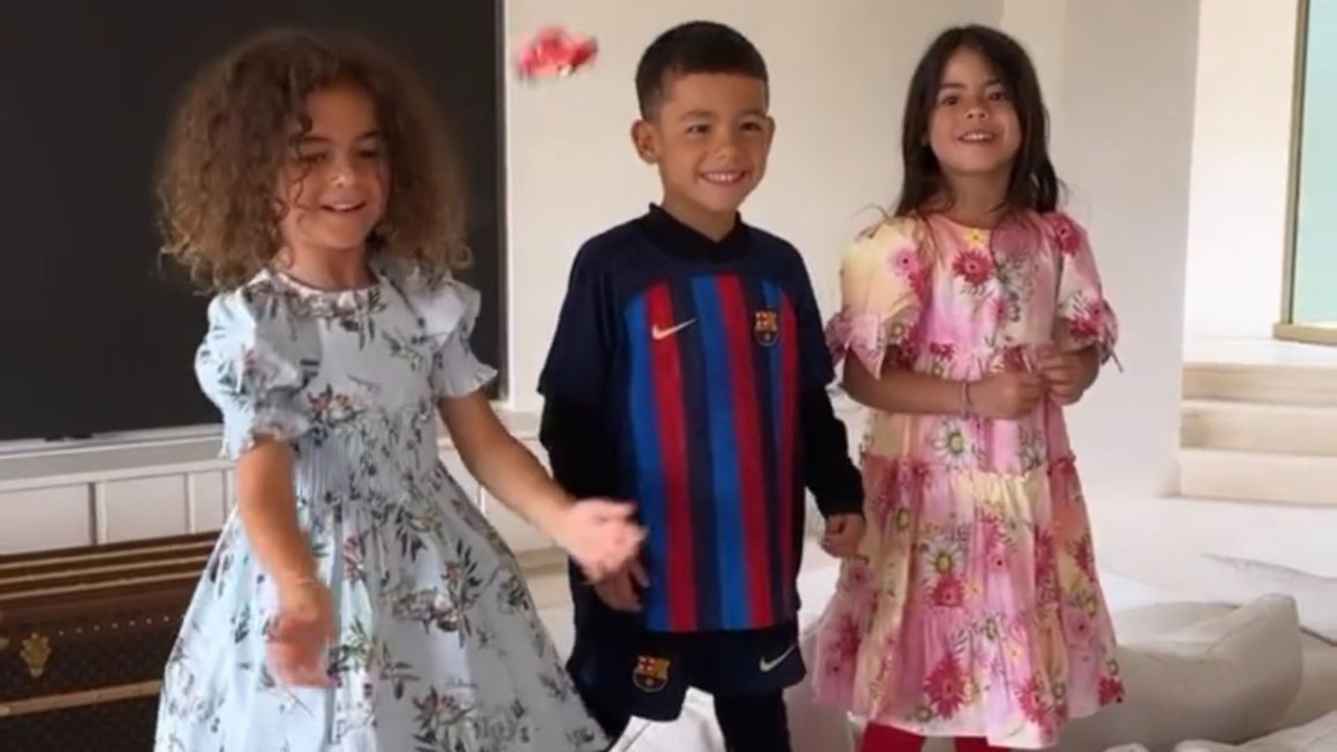 Cristiano Ronaldo s son celebrates wearing Barcelona jersey