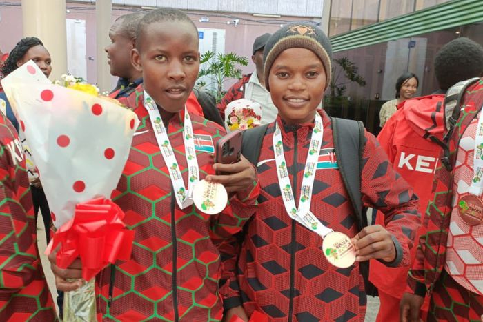 Junior athletes pose for a photo after arriving in Kenya from the Africa U18/20 Championships