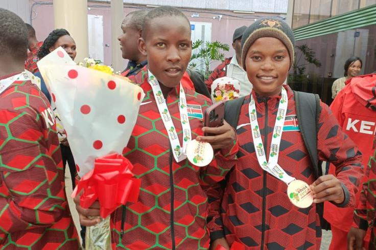 Junior athletes pose for a photo after arriving in Kenya from the Africa U18/20 Championships