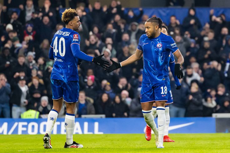 Christopher Nkunku (Chelsea FC) celebrates after scoring with Renato Veiga (Chelsea FC) at Stamford Bridge COLORSPORT DANIEL BEARHAM