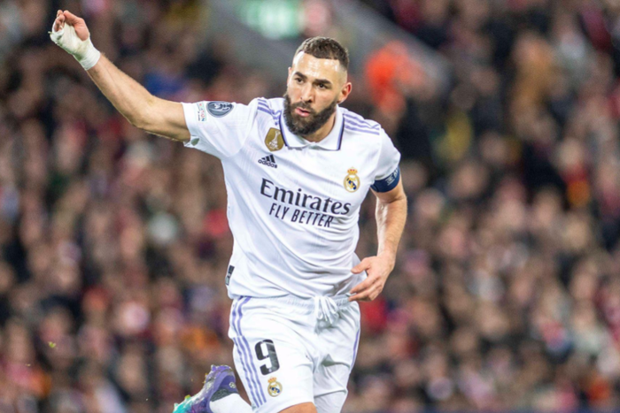 Benzema celebrates after scoring against Liverpool