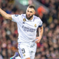 Benzema celebrates after scoring against Liverpool