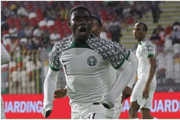 Golden Eaglets star Charles Agada celebrates for Nigeria.