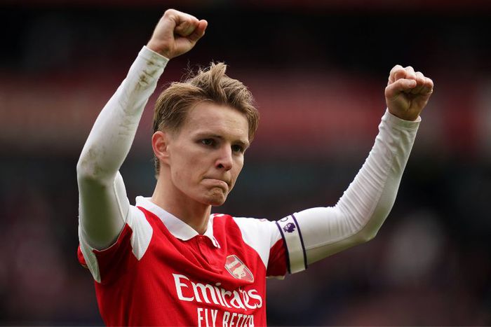 Arsenal s Martin Odegaard celebrates after the Premier League match at the Emirates Stadium, London