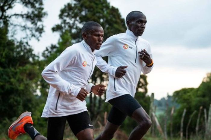Laban Korir with World Marathon record holder Eliud Kipchoge